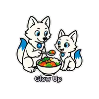 a sticker of two foxes eating a bowl of vegetables with the words glow up below them