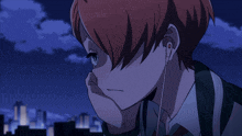 a girl with red hair is wearing headphones and looking down at something