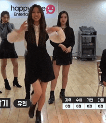 a girl is dancing in front of a sign that says happy entertain