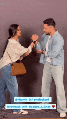 a man and a woman are standing next to each other and holding hands