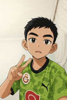 a boy in a green shirt with the letter g on it giving a peace sign