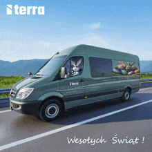 a green van that says terra on the side