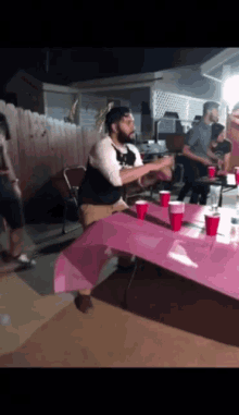 beer pong dancing excited