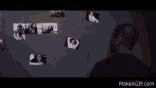 a man is covering his ears with his hands in front of a collage of photos .