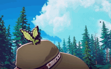 a hat with a pixelated butterfly on it