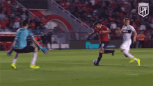 a blurry picture of a soccer game with a logo that says life