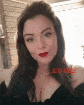 a woman with red lipstick and the name annabee
