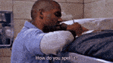 a man laying on a bed with the words " how do you spell it " below him
