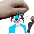 a hand is putting a cookie on top of a blue and white furry animal .