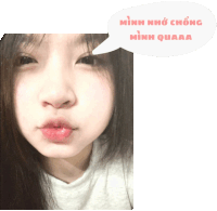 a girl with a speech bubble that says minh nho chồng minh quaaa