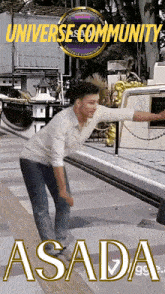 a man in a white shirt is standing on a sidewalk in front of a vehicle that says asada on it