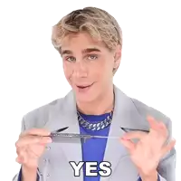a man in a blue shirt is holding a piece of metal and the word yes is written above him