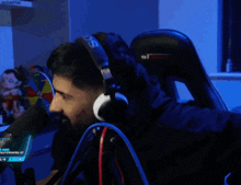 a blurry picture of a man wearing headphones with the word smashley on the bottom left