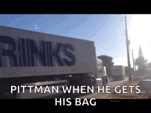 a truck with rinks written on the side of it