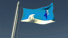 a blue and white flag with a polar bear on the left side