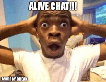 a man is making a funny face with his hands on his head and the words `` alive chat !!! '' written on it .