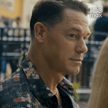 a close up of a man 's face with a hbo max logo in the corner