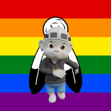 a cartoon character with a hoodie that says that is standing in front of a rainbow flag
