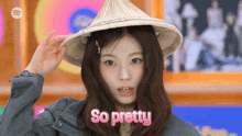 a woman wearing a hat with the word so pretty on it