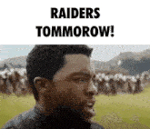 a man with a beard stands in front of a crowd and says raiders tommorow