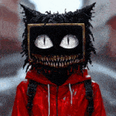 a person wearing a red jacket and a black cat mask on their head