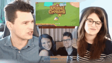 a man and a woman are playing animal crossing new horizons