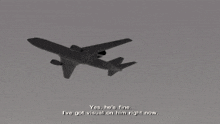 two fighter jets are flying in the sky and one has the number 7 on it