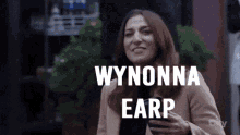wynonna earp is the name of the woman in this animated image