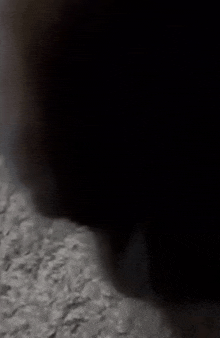 smoke is coming out of a hole in a wall