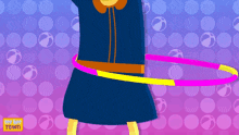 a girl in a blue dress is playing with a hula hoop with the words " try me town " on the bottom