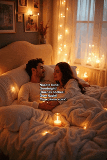 a man and a woman are laying in bed with candles in front of them and a caption that says " goodnight "