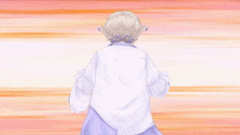 a woman in a white dress is being held by a hand