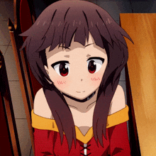 a girl with a choker around her neck is sitting in front of a table