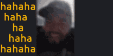 a blurry picture of a man with the words ' hahaha ' on the bottom right