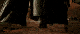 two warriors standing next to each other in a video game scene