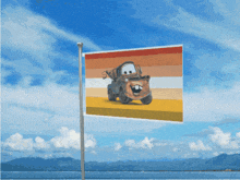 a flag with a picture of a tow truck is flying in the wind