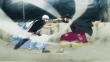 a couple of anime characters are fighting each other in a battle .