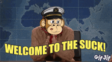 a cartoon monkey is sitting at a desk with the words welcome to the suck below him