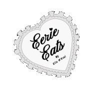 a heart with the words erie eats on it