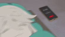 a blurry picture of a person laying on a bed next to a cell phone that says 4:59