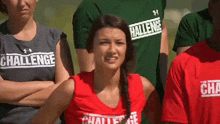 a group of people wearing shirts that say challenge