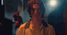 a man in a white shirt with a name tag that says ' chris '