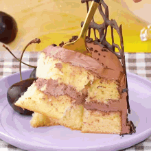 a slice of cake with chocolate frosting is on a plate
