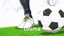 a soccer ball that says touma on it