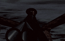 a dark background with a light coming out of the middle