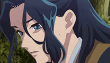a close up of a cartoon character with blue hair