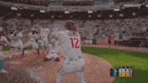 a group of twins baseball players celebrate a win