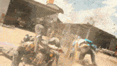 a group of superheroes are fighting in front of a garage