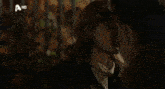 a woman is touching a man 's face in a scene from a hd show