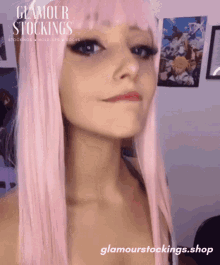 a woman with pink hair is wearing glamour stockings stockings hold ups and socks